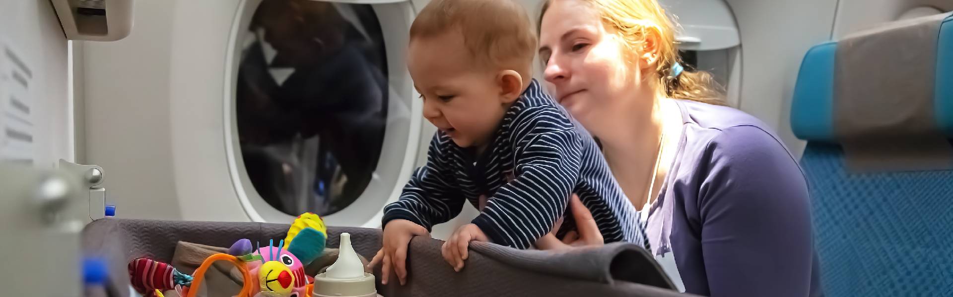 kids playing with toys while flying in plane